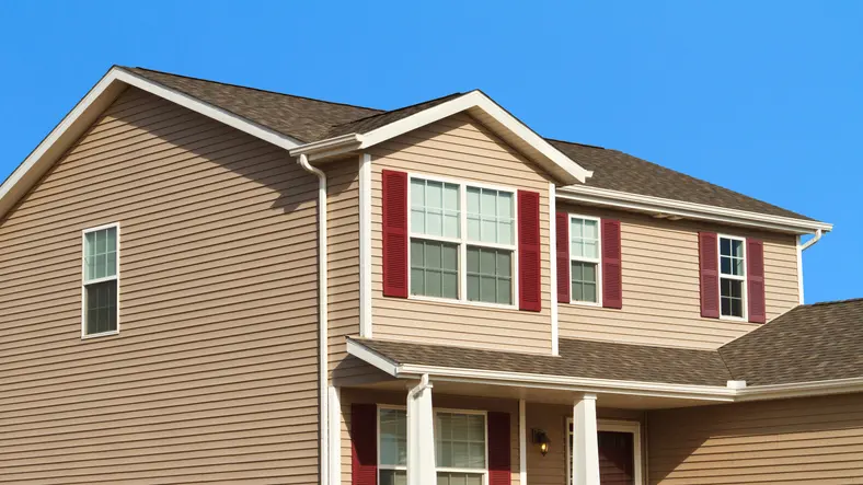 New home construction,showing siding,roof,and gutters