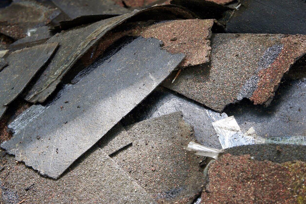Spread out old roofing shingles
