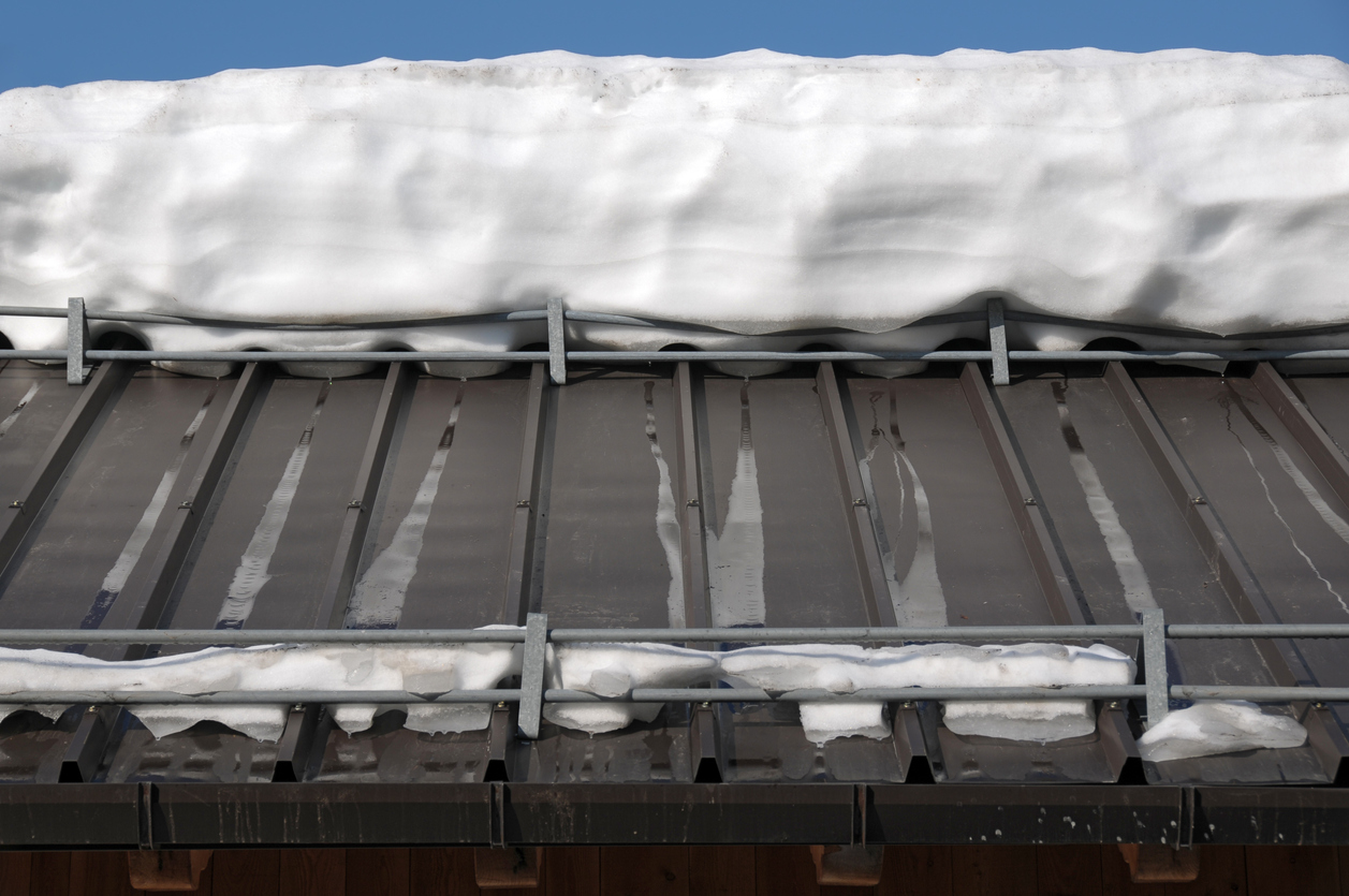 Snow melting on roof