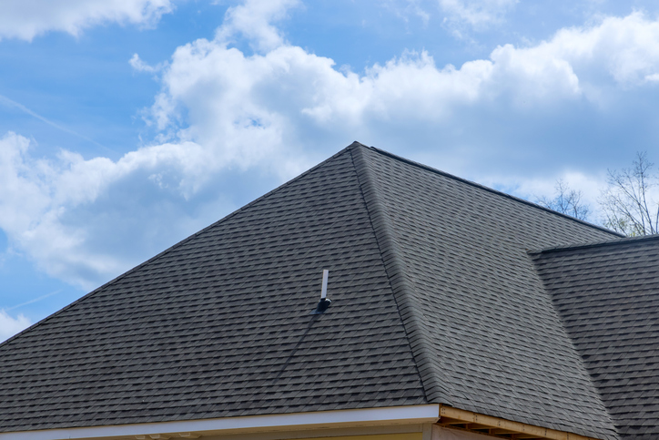 Rooftop construction on roof covered asphalt shingles roofing construction new house