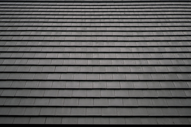 Pattern of black square-shaped roof tiles